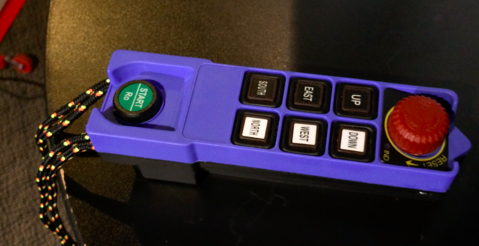 A remote control device for a crane used in a crane hacking demo