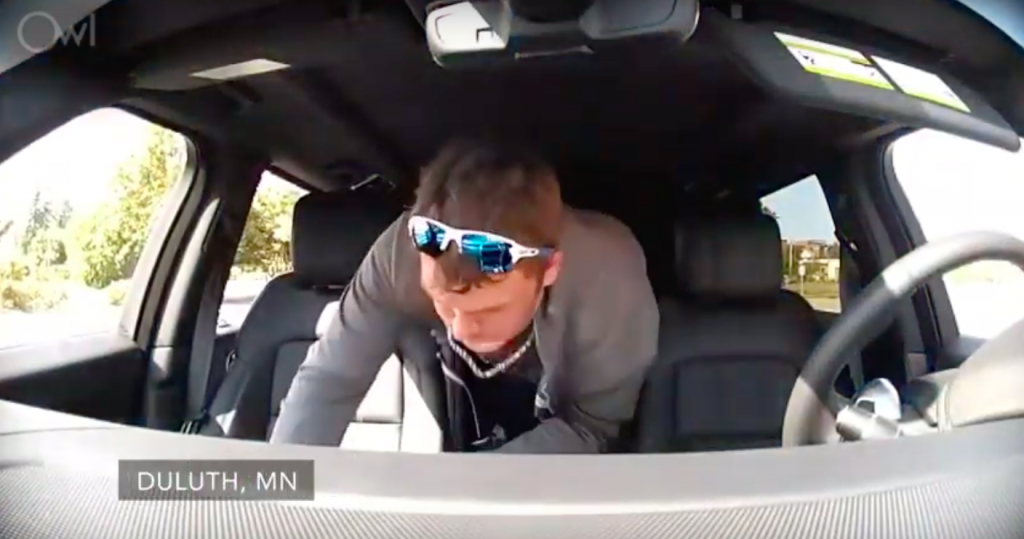 car security video shows a thief inside a car