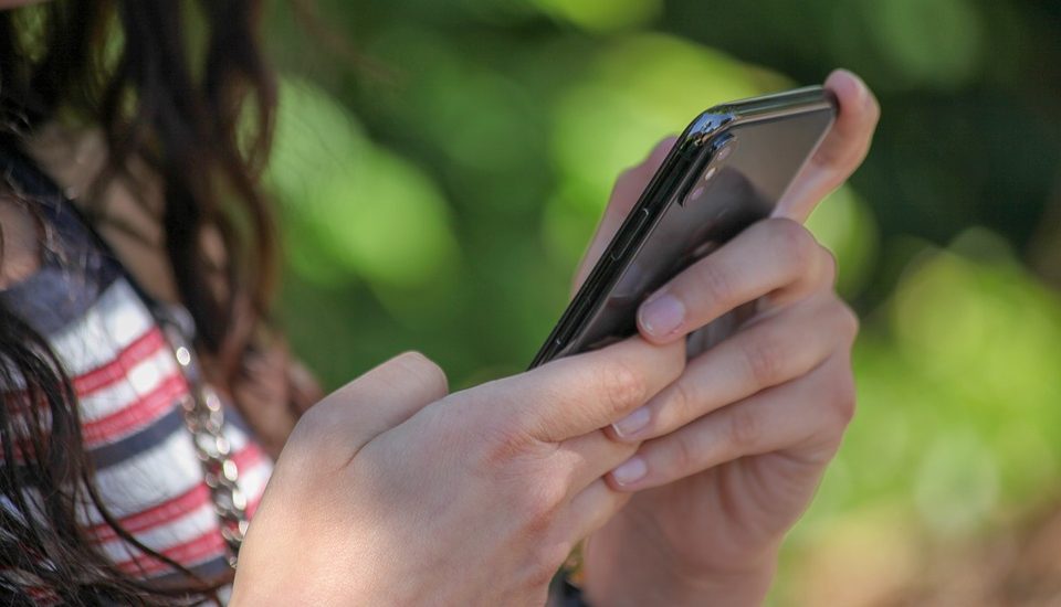 teenager with phone