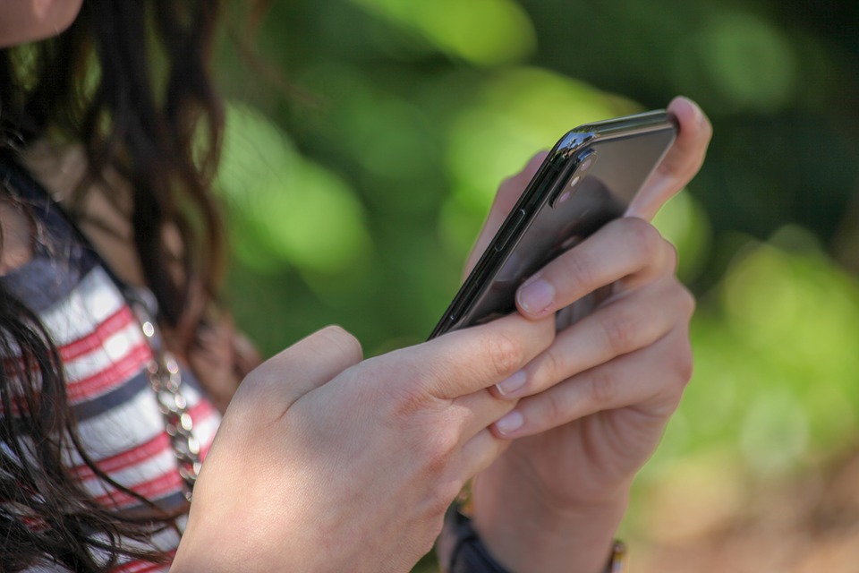 teenager with phone