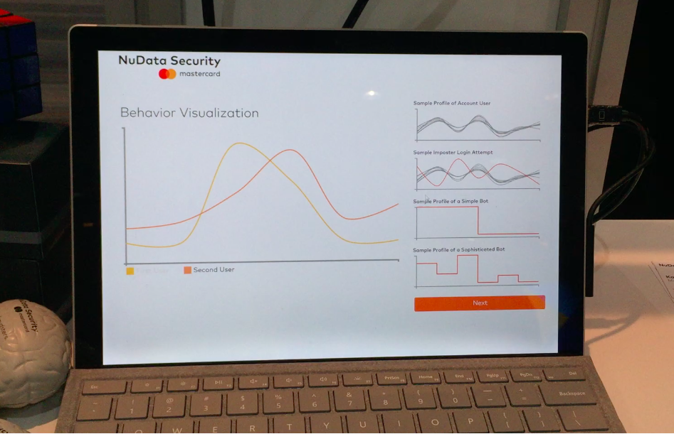 typing authentication test results on laptop screen